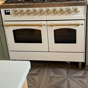 White and Gold Dual Fuel Range Oven